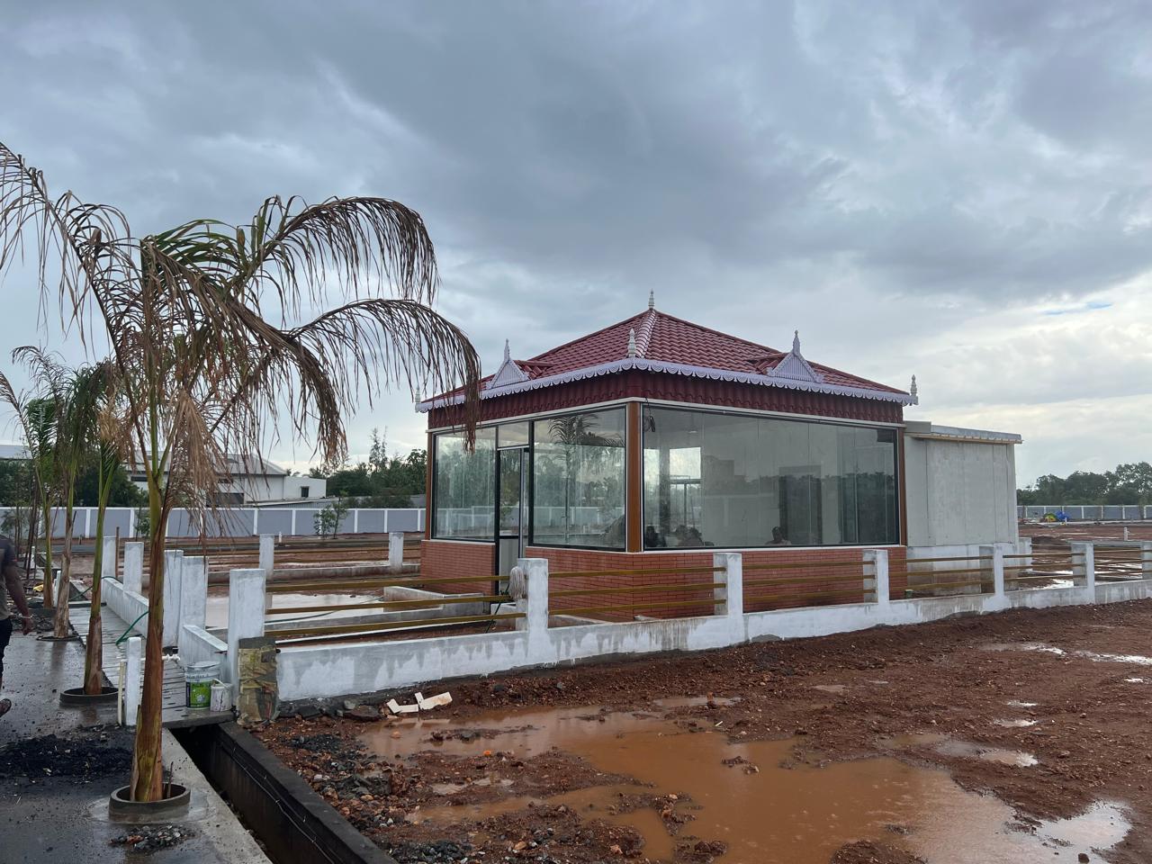 The compound wall around the community