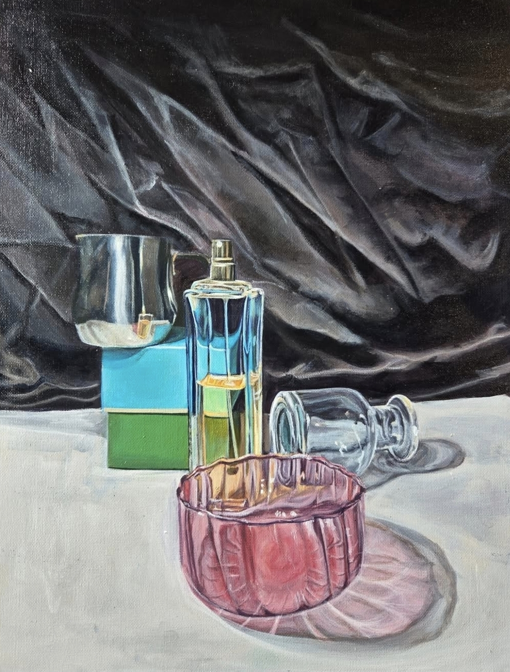Love Quetee still life painting of lemons, a knife, a cloth, and a small package on a table