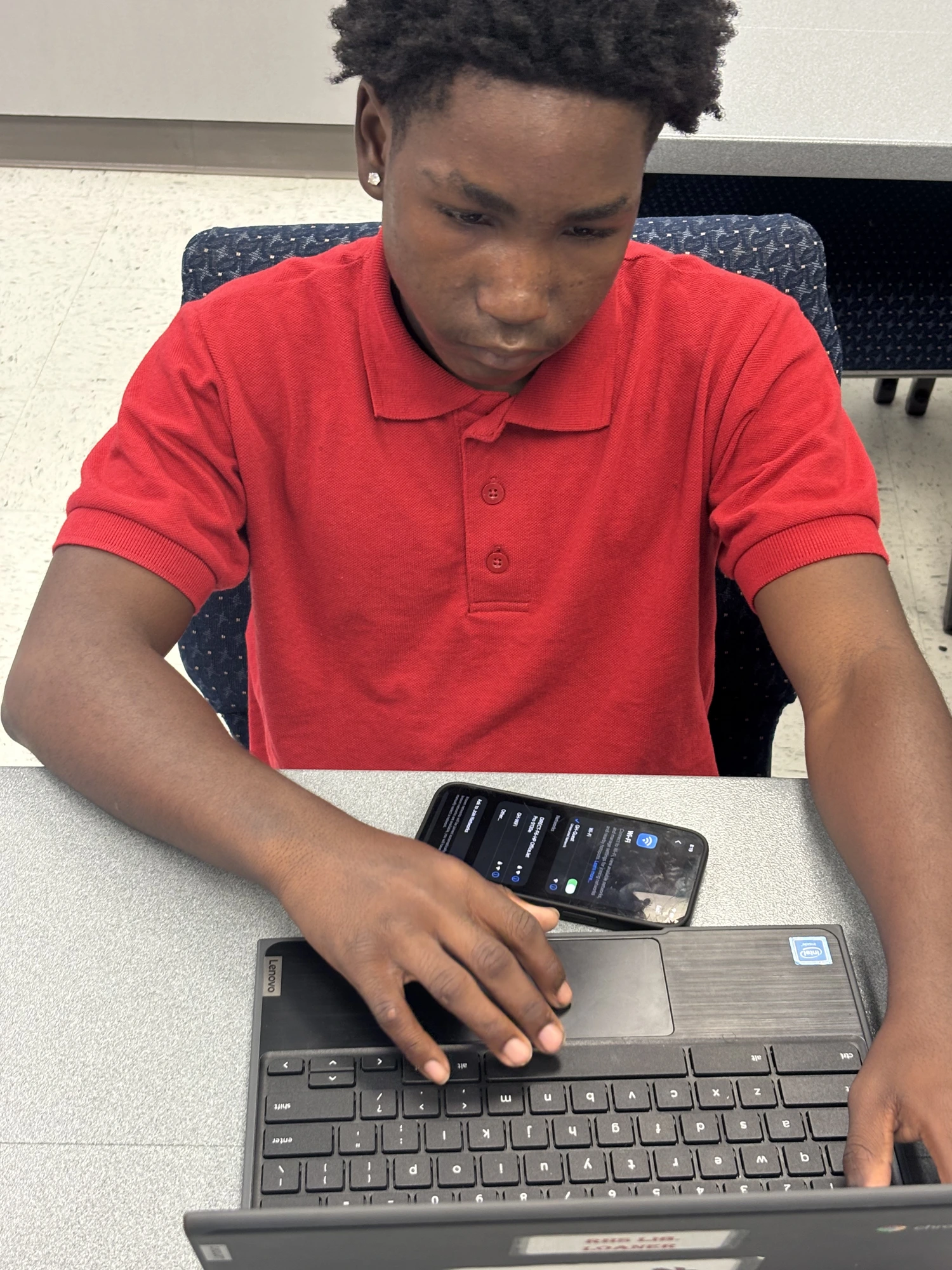 Student working on a laptop