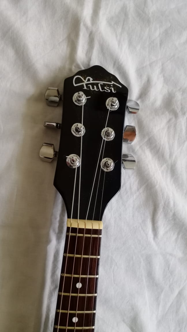 Tulsi headstock detail