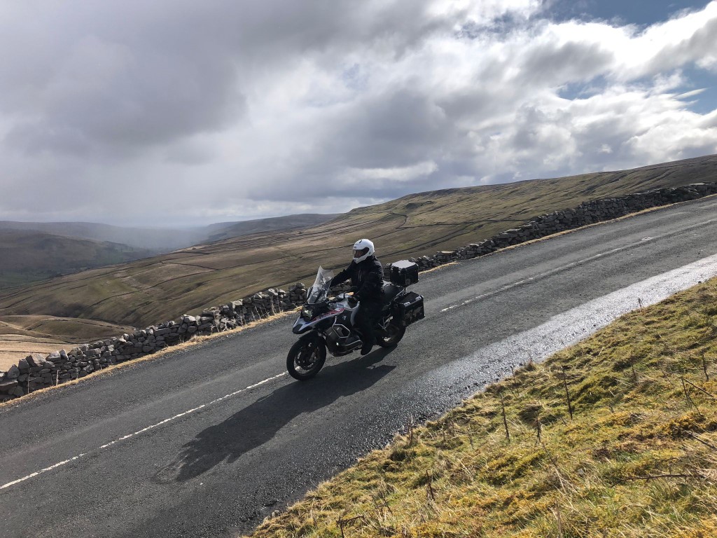 Rider on a scenic moorland road