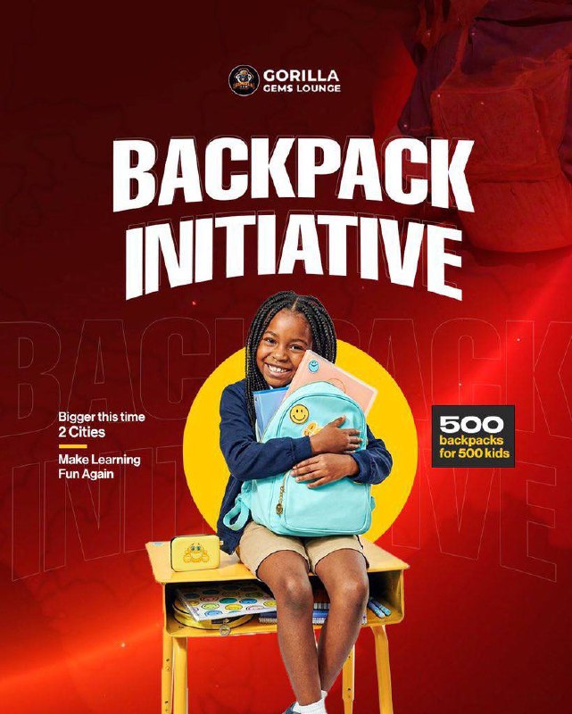 A smiling student receives backpacks and learning supplies